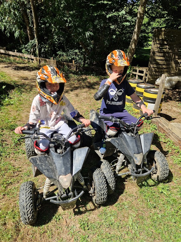 Our Kids getting ready to ride Quads in the woods, France Summer 2023.